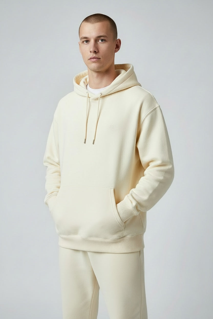 Pavel & Co oversized cream heavyweight cotton-blend hoodie with dropped shoulders and kangaroo pocket on a male model