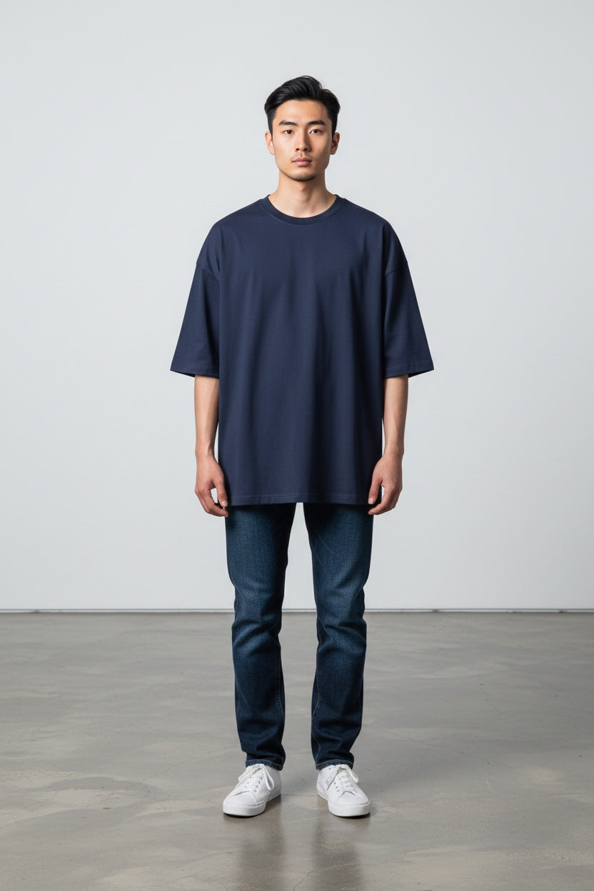 Pavel & Co Metropolis navy blue heavyweight cotton French Terry boxy fit t-shirt with dropped shoulders on a model