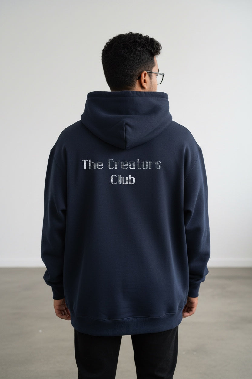 Pavel & Co oversized navy hoodie with The Creators Club text on the back, made from heavyweight cotton-blend loopknit.