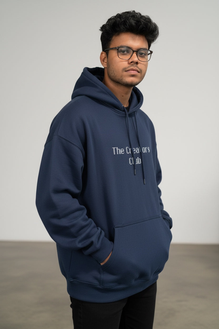 Pavel & Co oversized navy blue heavyweight cotton-blend hoodie with The Creators Club print on a male model