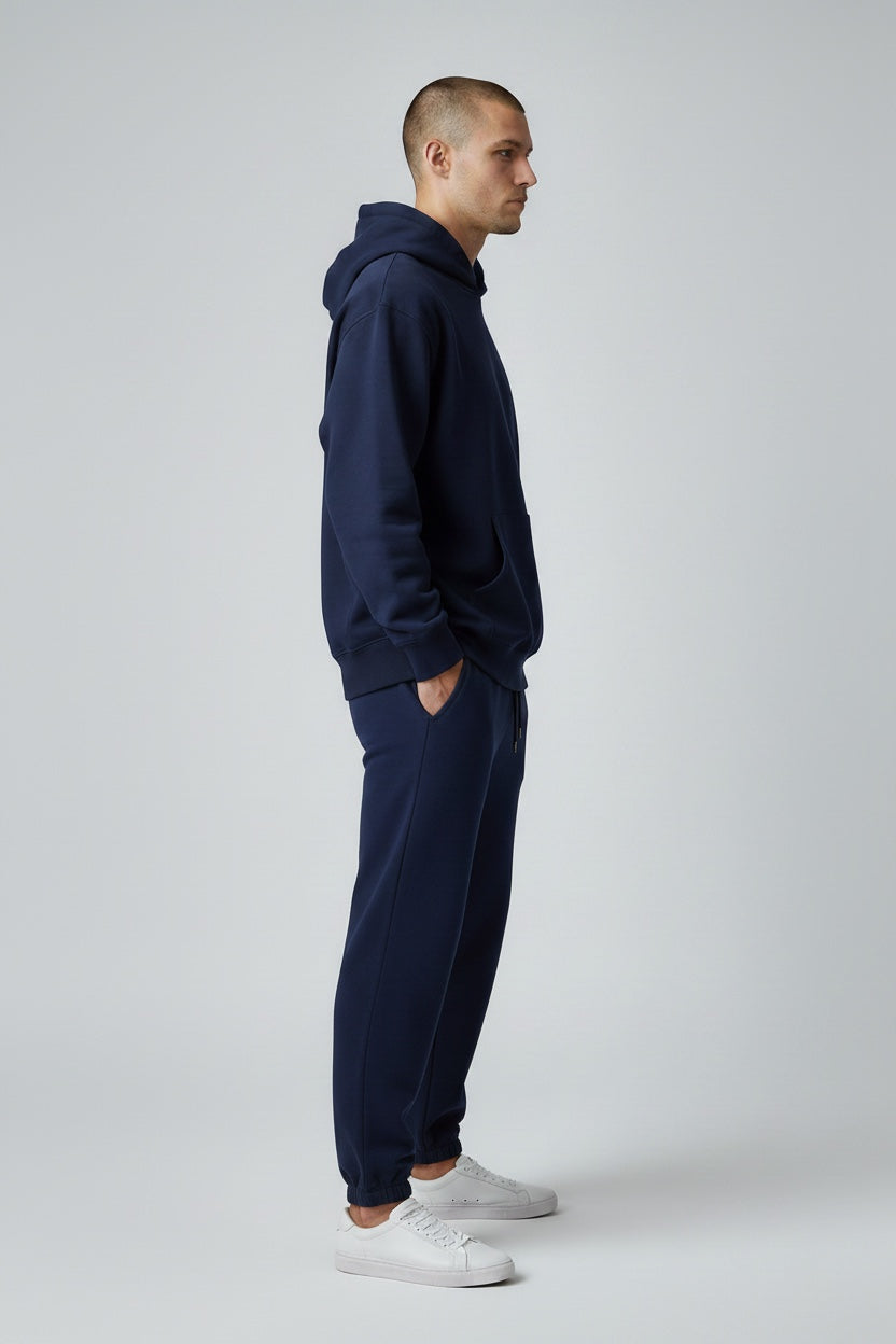Pavel & Co navy blue oversized heavyweight cotton-blend hoodie and matching sweatpants worn by a male model