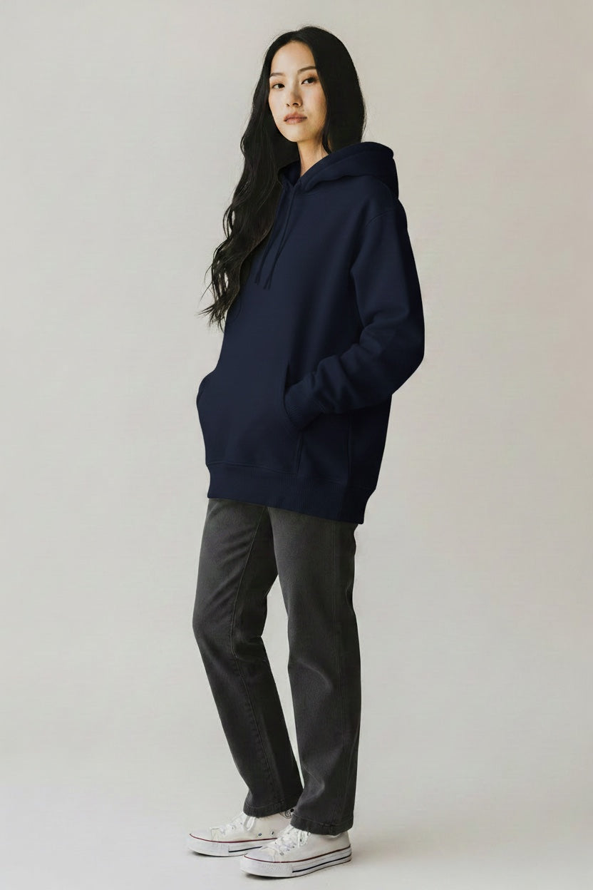 Pavel & Co navy blue oversized heavyweight cotton-blend hoodie with dropped shoulders and kangaroo pocket on a model