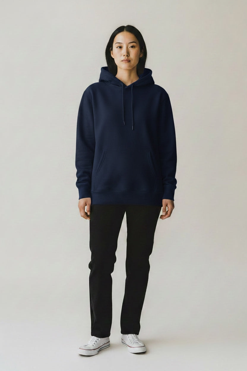 A model wearing a Pavel & Co navy blue heavyweight cotton-blend oversized hoodie with a kangaroo pocket.