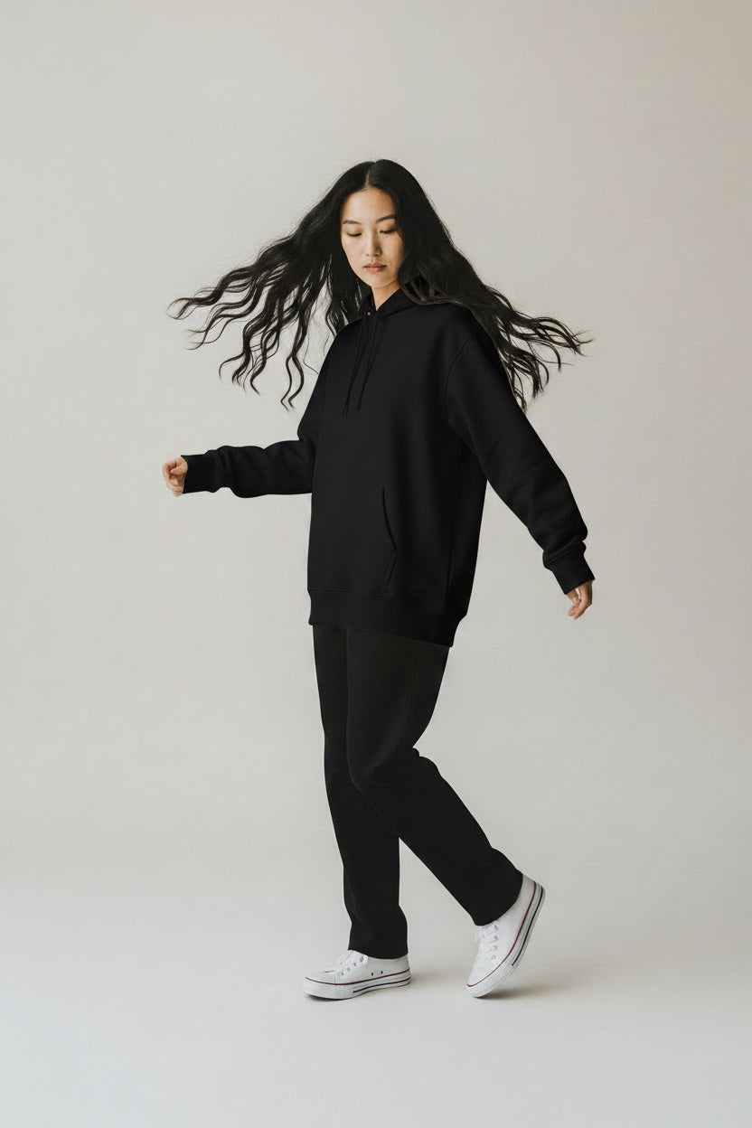 Pavel & Co oversized black heavyweight cotton-blend hoodie with dropped shoulders and kangaroo pocket on a model
