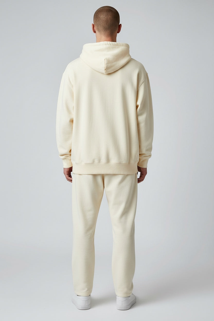 Pavel & Co oversized cream heavyweight cotton-blend hoodie with dropped shoulders and ribbed hem, back view.